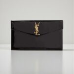 YSL Uptown Pouch in Glossy Black Patent Leather