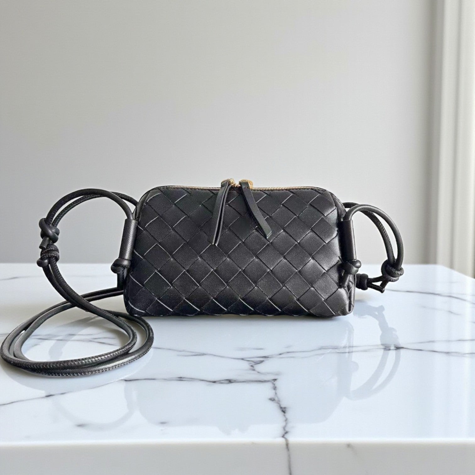 Bottega Veneta Black Concert Pouch in Leather
