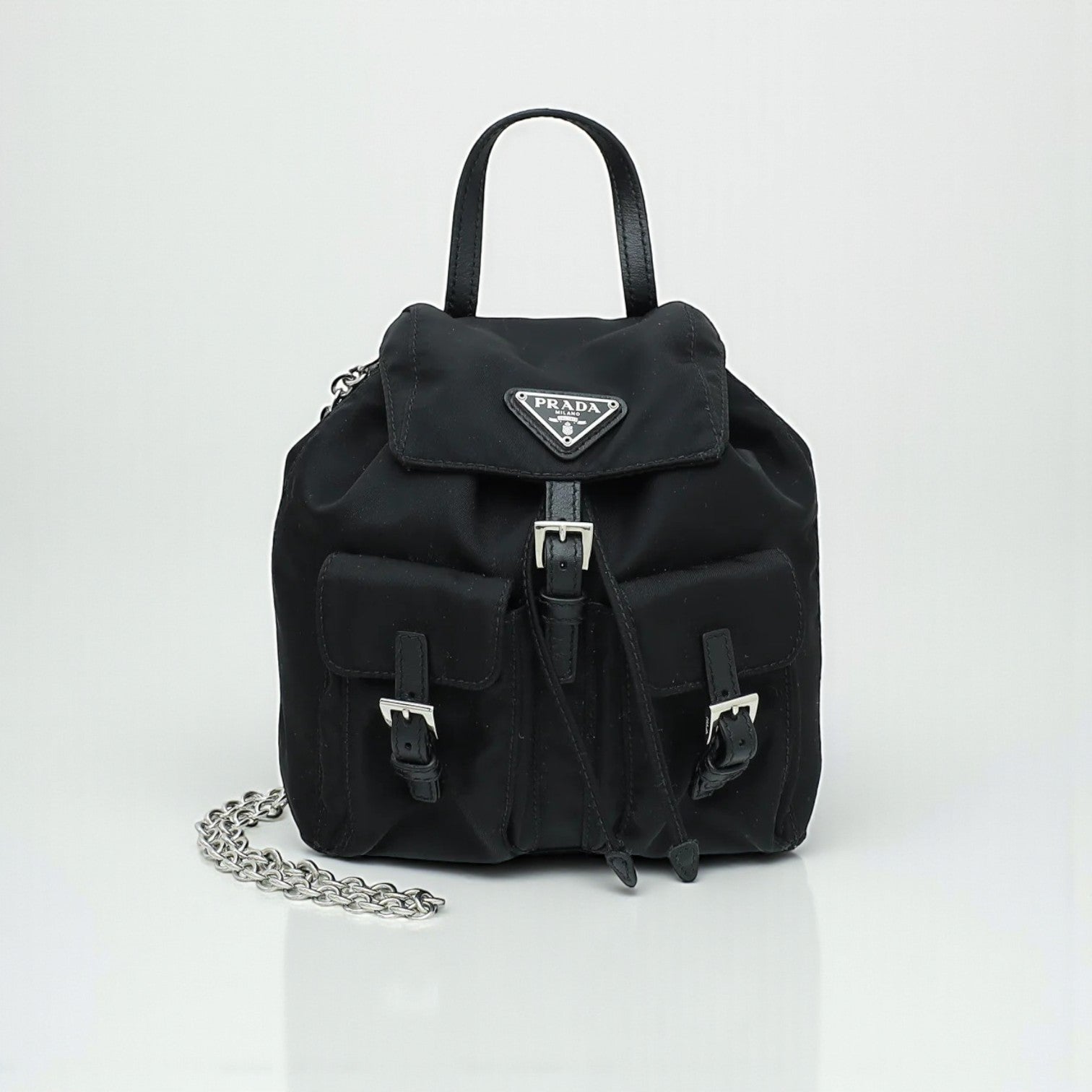 Prada Re-Nylon Mini Backpack, Nylon & Nappa Leather, Chain Strap, H 16 x L 16 x W 8 cm